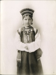 Young Russian woman in traditional cultural dress from South Russia