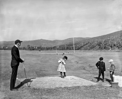Young Girl Plays Golf
