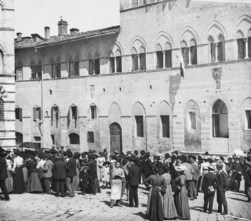 Victorian Crown Gathered Outside A Church Or Public Building in Italy.