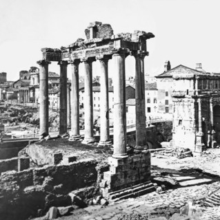 Ruins Of The Temple Of Saturn In The Roman Forum, Rome, Italy.