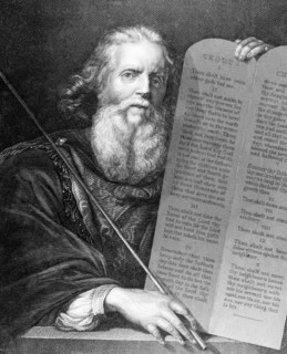 Moses Writing The Commandments On A Tablet Of Stone.