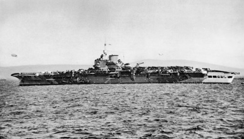 Aircraft Carrier H.M.S. Victorious at anchor.