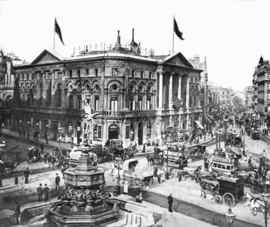 Horses and carts lining the streets as smartly-dressed Londoners clad in dark coats go about their business.