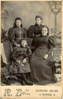 A family portrait of four ladies.