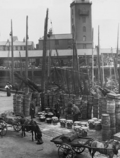 Fish Quay with fishing boats and fishermen.