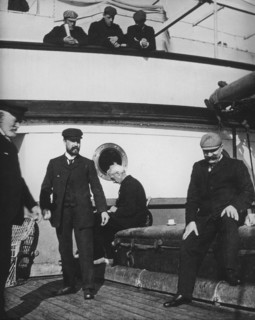 Crew and passengers on board ship.