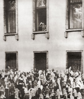 Germans cheering Hitler on hearing the news of his election as chancellor in 1933.