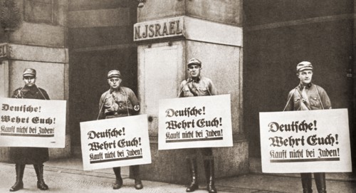 Seen here in 1933 outisde Jewish owned stores.