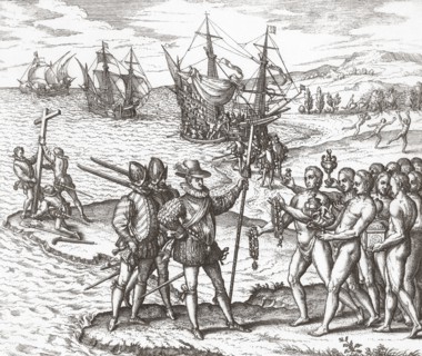 Christopher Columbus lands in the New World.