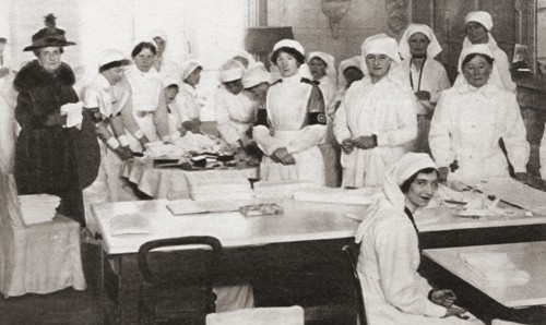Women volunteers making bandages and crutches during WWI.
