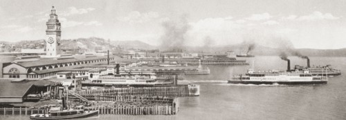 The ferry slips in front of the The San Francisco Ferry Building.