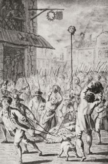 The head of Joseph-Francois Foullon de Doue stuck on a pike and paraded through the streets of Paris after being beheaded by the crowd during the French Revolution in 1789.