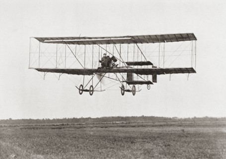 Henri Farman winning the Grand Prix of two thousand pounds for the longest flight of 112 miles in a Farman III Biplane.