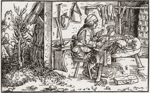 A self employed labourer working at home during the Tudor period in England.