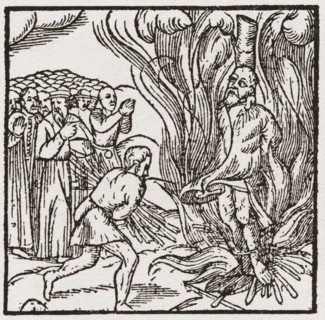 A heretic being burnt at the stake during the Tudor period in England.