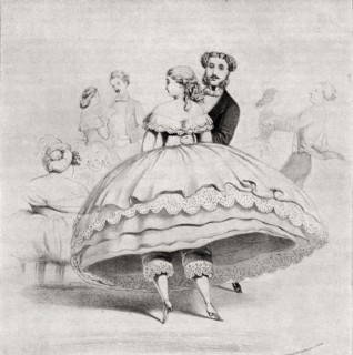 19th century lady arriving at a ball wearing a crinoline.