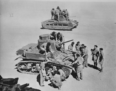 An American 11 ton tank and a British tank.