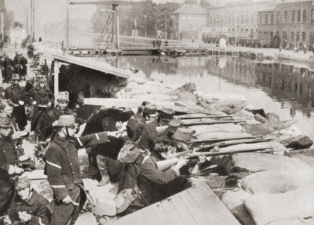 Belgian soldiers defending the sandbagged Willebrock Canal from the advancing Germans during WWI.