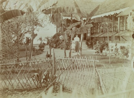 View of Marjory and Anne Wood standing in their garden