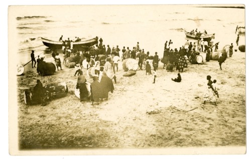 Rolling barrels on the beach