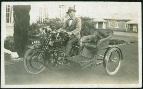 Bertie Rand on a motorbike outside the Nairobi Police Depot
