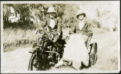 European men with motorbike and sidecar