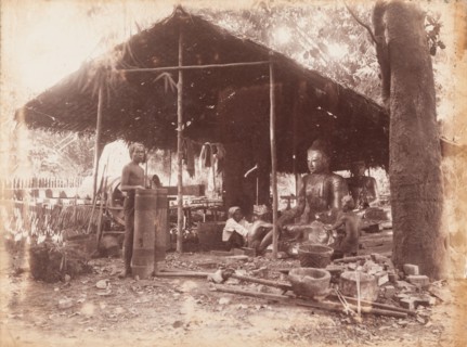 Burmese craftsmen making Buddha sculptures