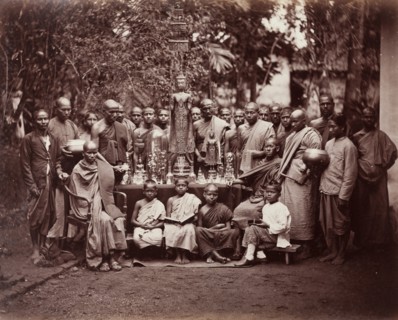 Group of Buddhist monks and altar, Kandy