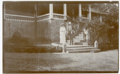 Two Europeans on steps of house, Gikiyanakanda plantation