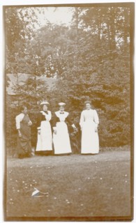 Four women in garden, Gikiyanakanda plantation