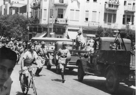 British police use weapons of clubs and shields to disperse demonstrators from an anti-Arab demonstration by Jews in Tel Aviv.