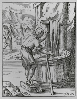The trades. The dyer. Facsimile after a drawing and engraving by Jost Amman in the 16th century.