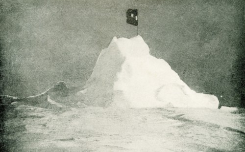This photo shows Peary's flag flying at the north Pole, April 1909. By the courteous permission of