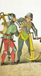 The figures represented here date to the A.D. 1400s. They represent two crossbow men. The