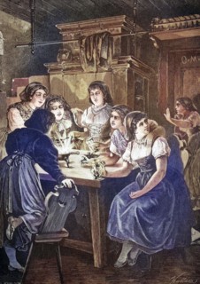 Group of women pouring lead on New Year's Eve.