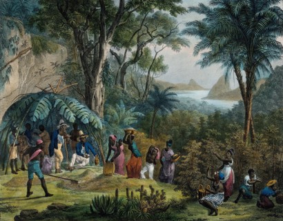 Indian workers harvesting coffee on a coffee plantation.