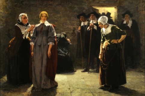 Witch hunt, young woman is accused of being a witch by the inhabitants and is to be led away by the
