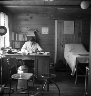 Physician in his surgery, in the 40s