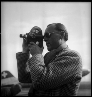 Prince Bernhard of the Netherlands holding a hand camera, Dvºbendorf 1946.