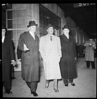 King Mohammad Zahir Shah (c) arriving in Geneva, 1950.