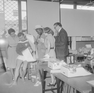 Olympic Games Rome 1960: Swiss athletes at press center.