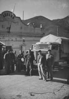Swiss truck, driver at the customs; 1944.