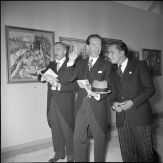 Enrico Celio (c) at an exhibition, 1941