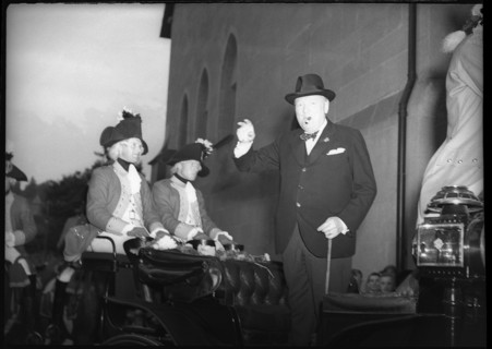 Winston Churchill standing on a coach, Berne 1946.