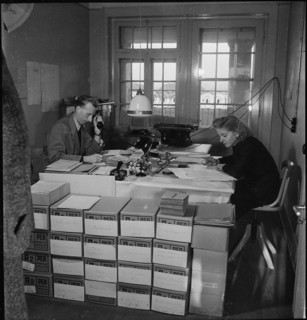 Public administration of food ration cards, coupons, around 1945.
