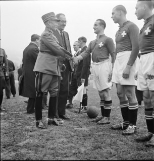 General Guisan greets the Swiss national soccer team, 1939.