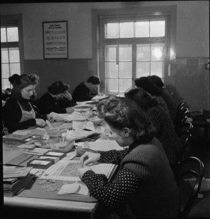Public administration of food ration cards, coupons, around 1945.