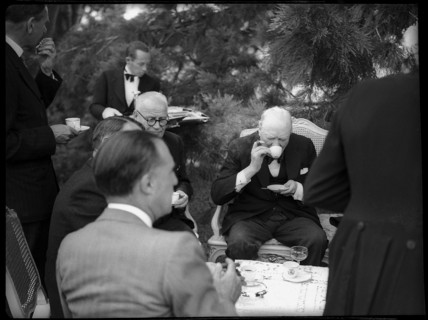 Winston Churchill with Swiss public figures at afternoon coffee 1946 .