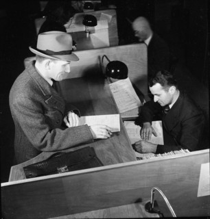 Public administration of food ration cards, coupons, around 1945.