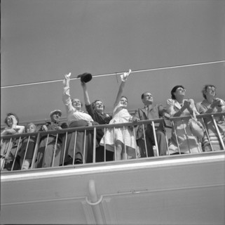 People waving to somebody on lookout terrace at airport Zurich-Kloten around 1956.